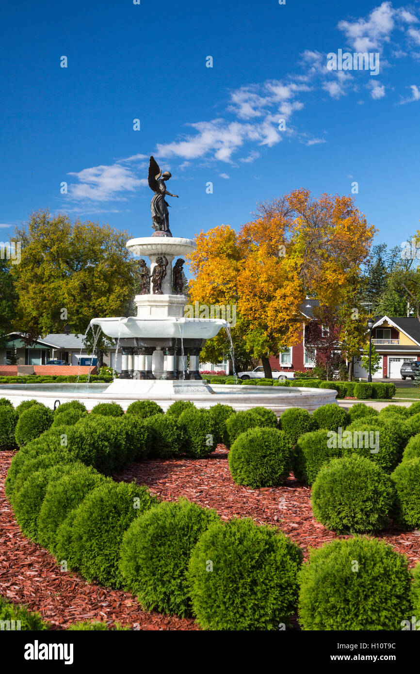 Angel of the Waters fountain in autumn in Bethel Heritage Park, Winkler