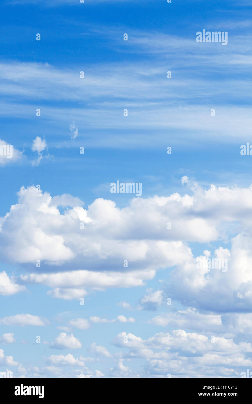 Fluffy white clouds in sky Stock Photo
