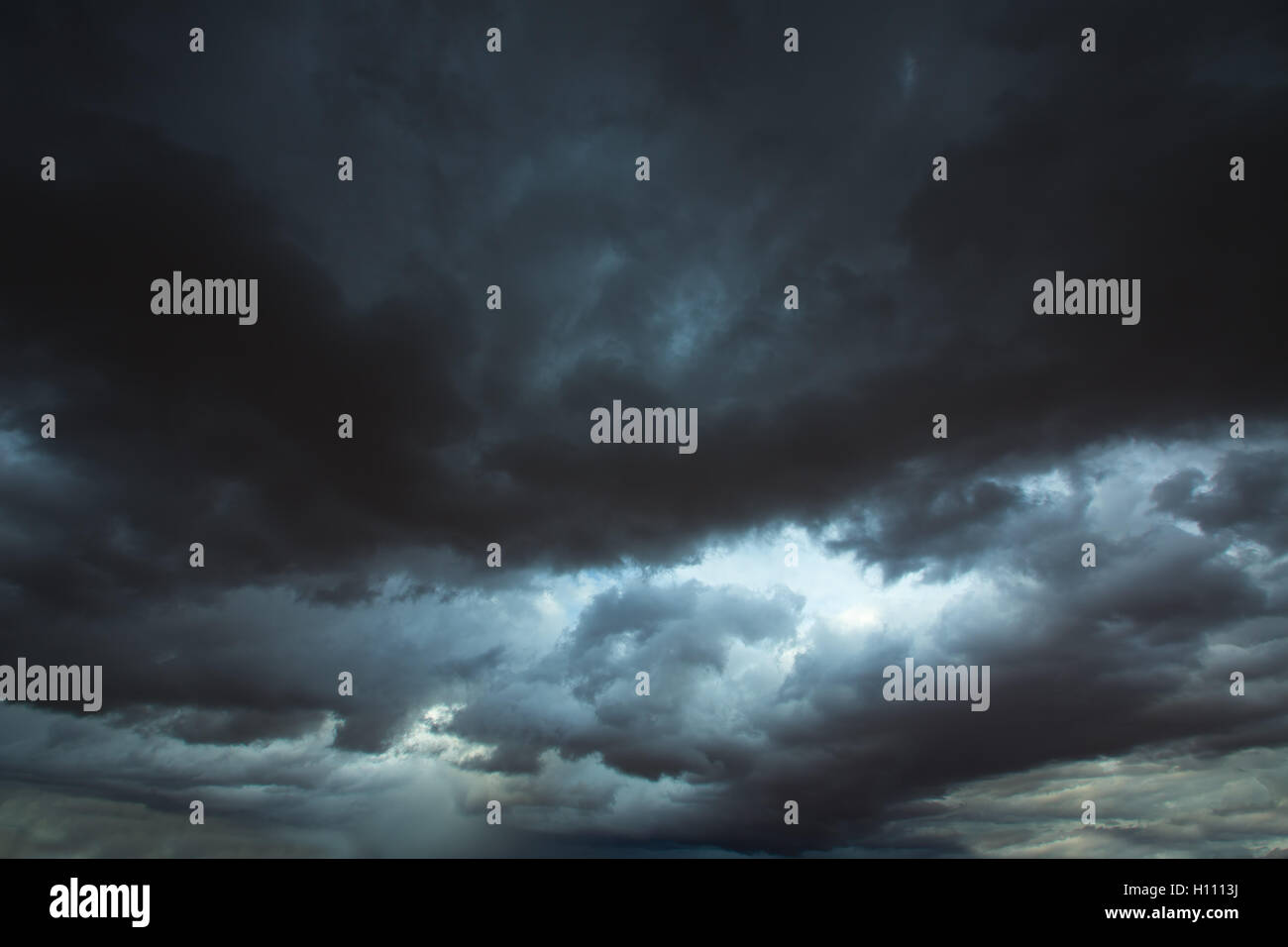 Stormy clouds gray sky with dramatic shadows Stock Photo - Alamy
