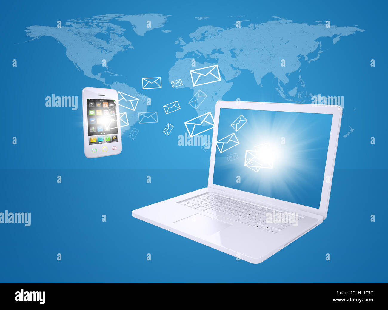 Laptop and smartphone exchange letters Stock Photo Alamy