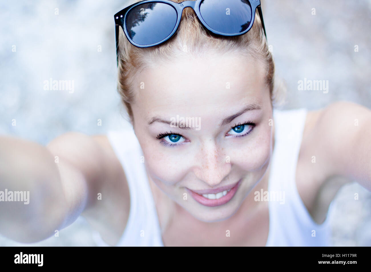 Portrait of a cheerful young woman Stock Photo - Alamy
