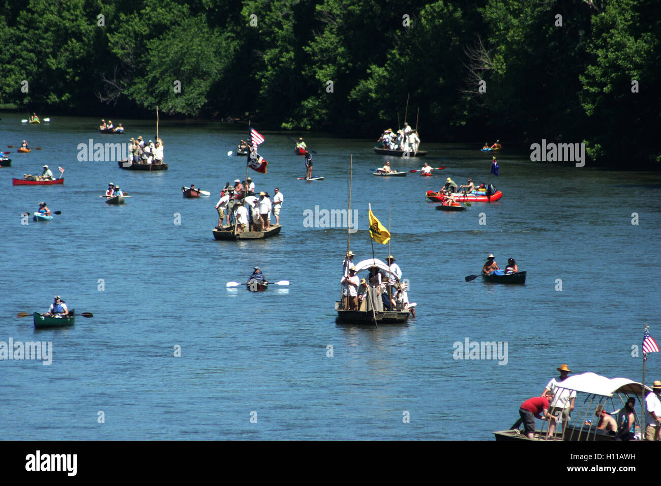 Various types of boats floating on James River at the kickof event for