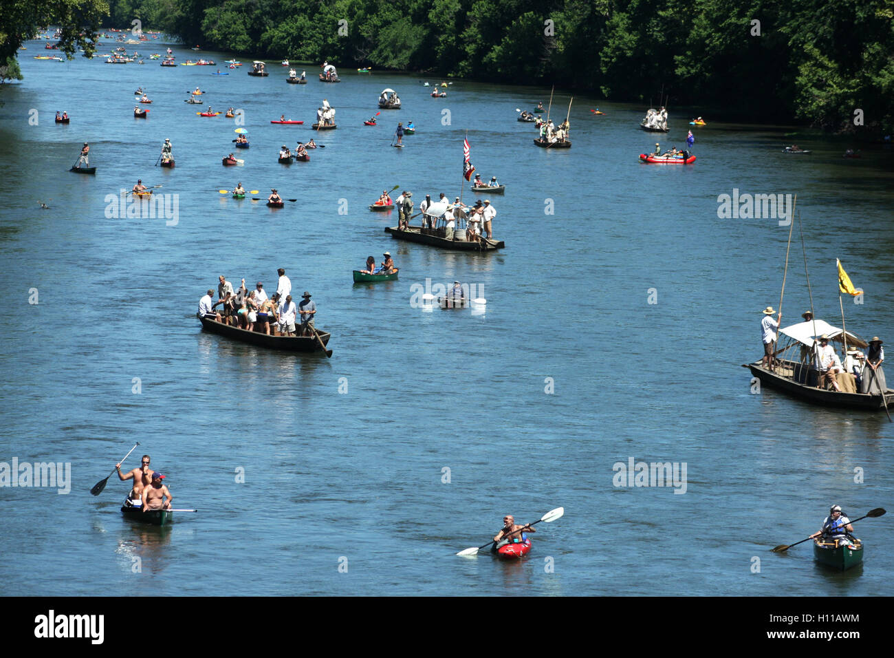 Various types of boats floating on James River at the kickof event for