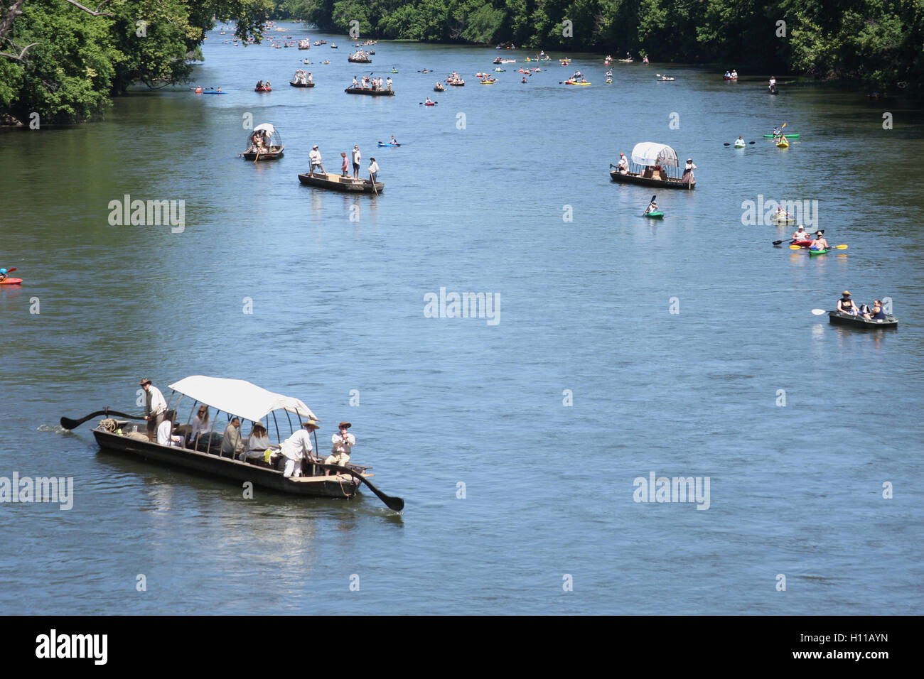 Various types of boats floating on James River at the kickof event for