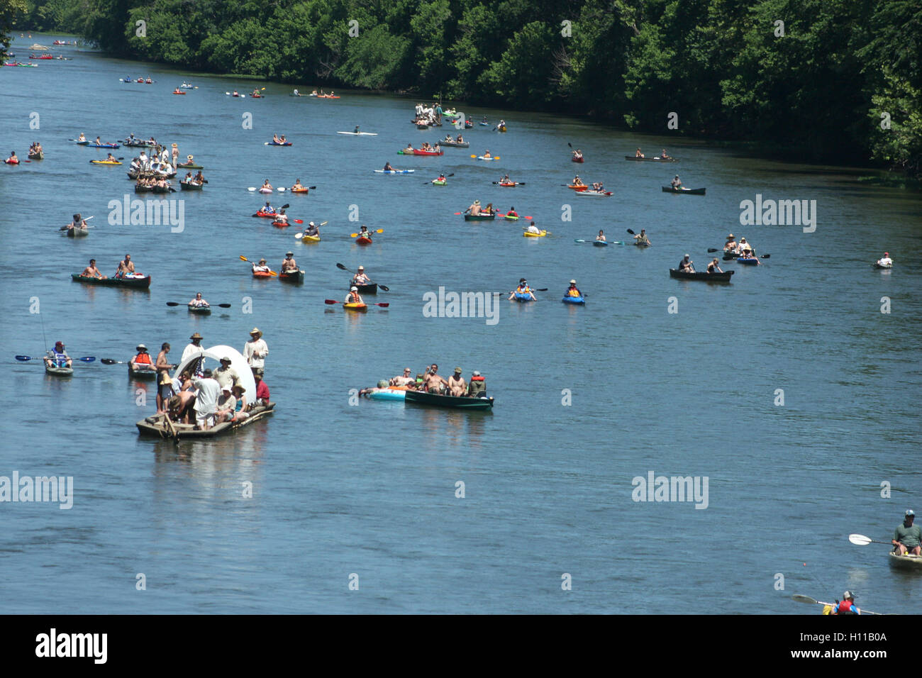 Various types of boats floating on James River at the kickof event for