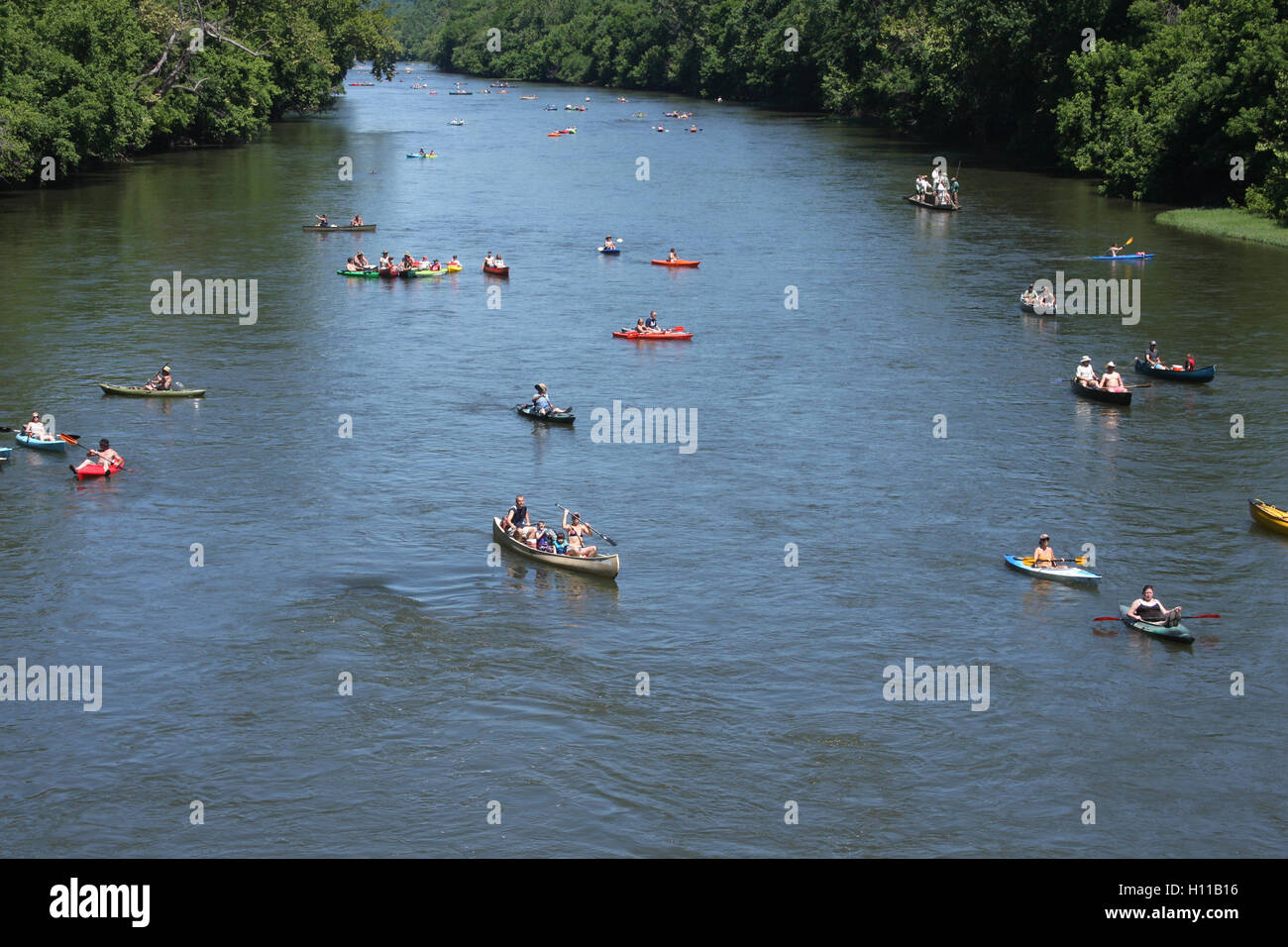 Various types of boats floating on James River at the kickof event for