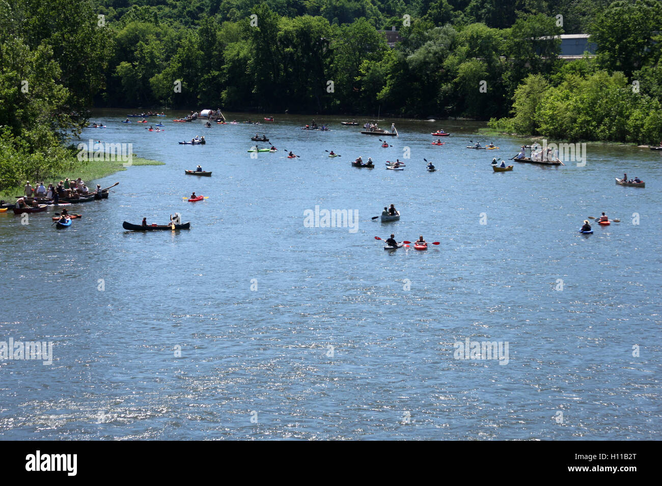 Various types of boats floating on James River at the kickof event for