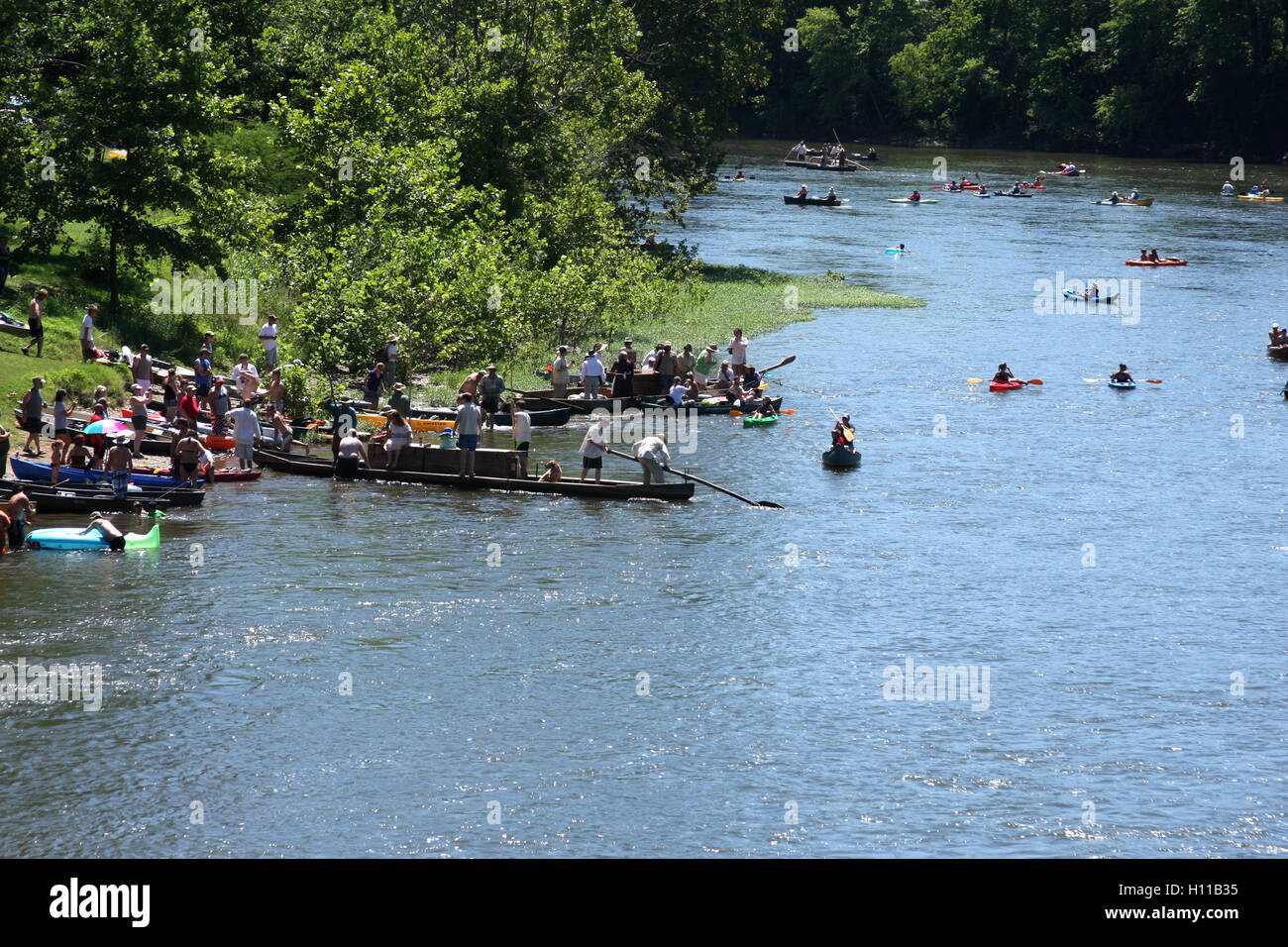 Various types of boats floating on James River at the kickof event for