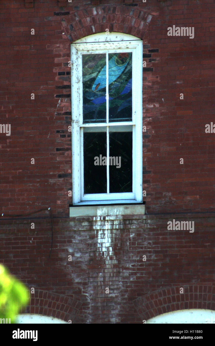 Window and wall on building in downtown Lynchburg, Virginia, USA Stock Photo