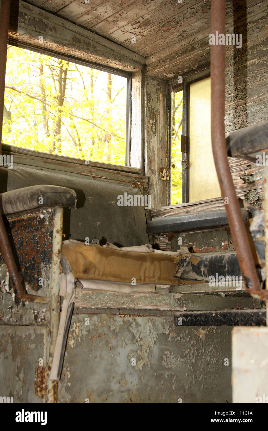 Inside an old abandoned train engine Stock Photo