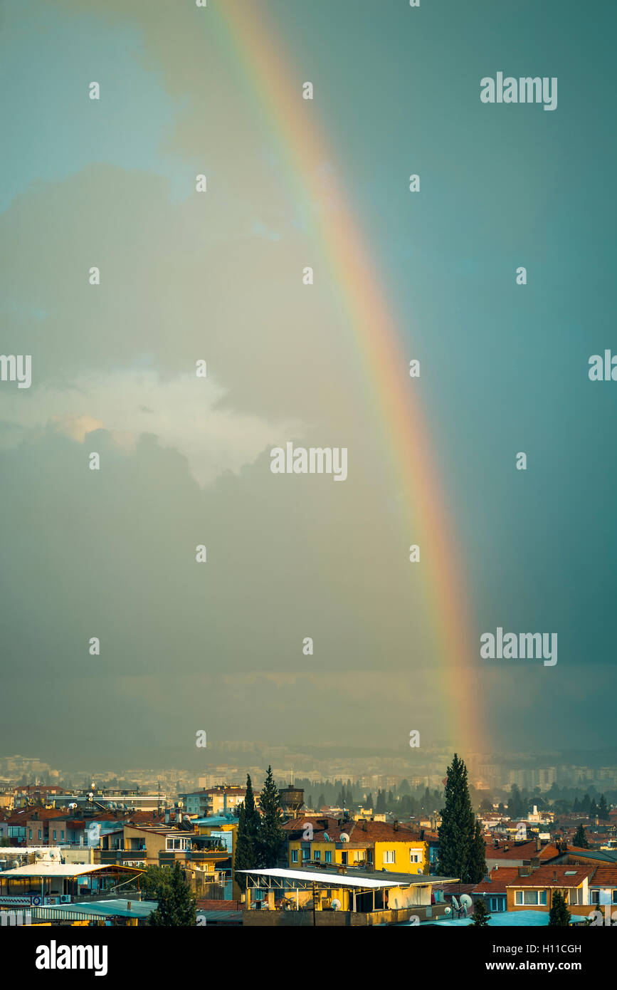 Rainbow and cloudy sky after the rain Stock Photo - Alamy