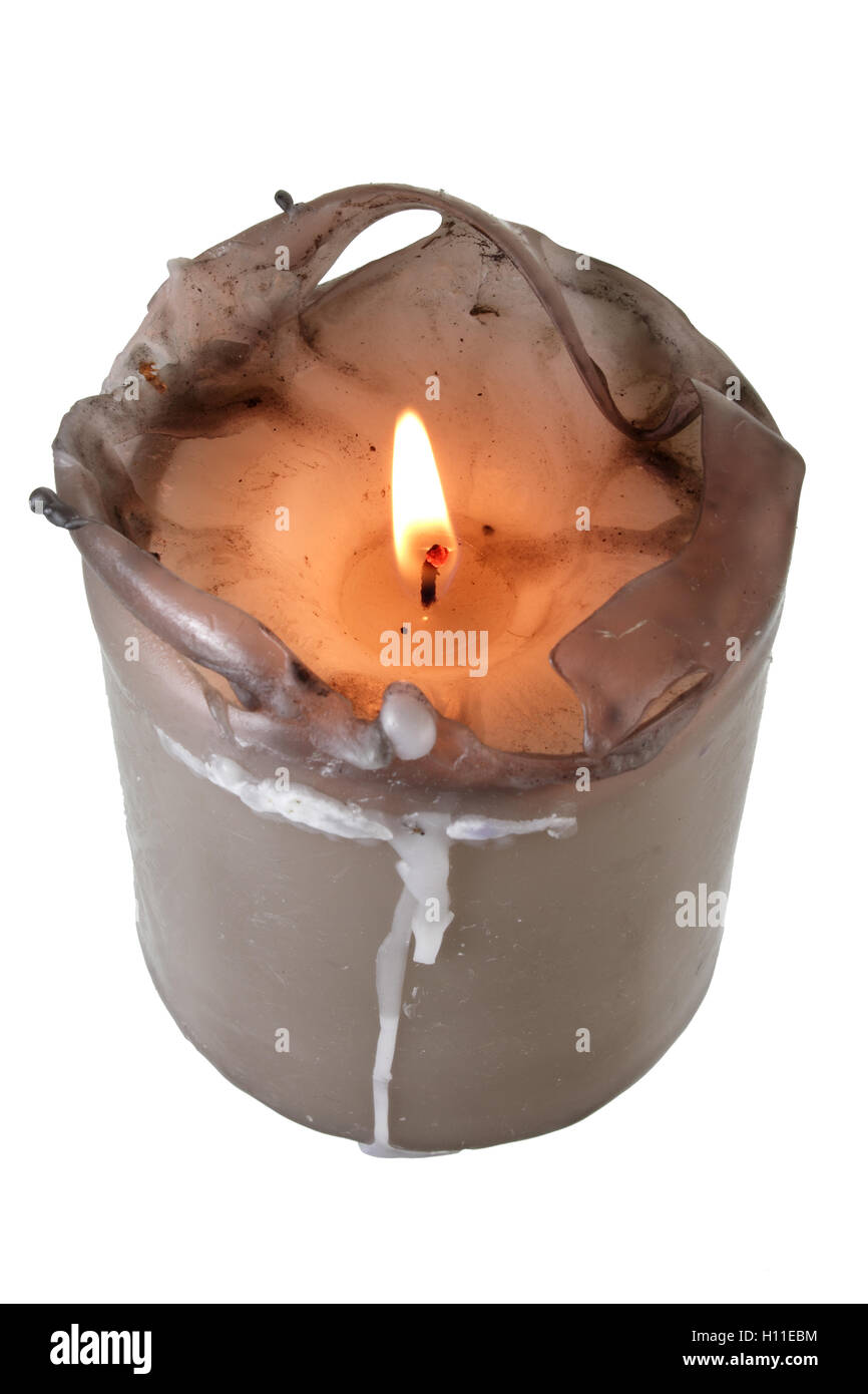 Two burning heart shaped candles and candies on a grungy background, Stock  image