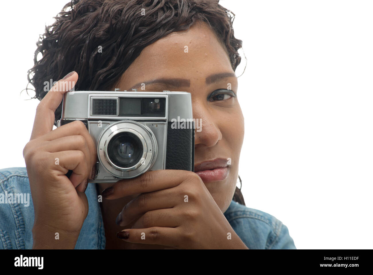 beautiful African woman with a camera on white background Stock Photo ...
