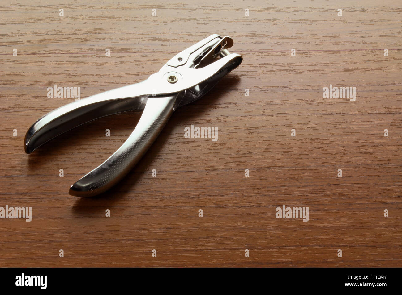 Hole puncher hi-res stock photography and images - Alamy