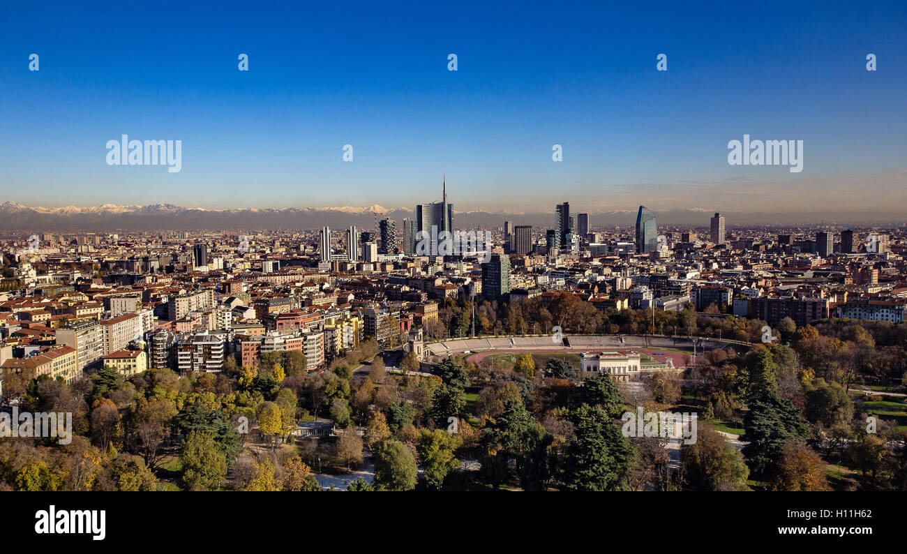 Panoramic aerial view of Milan from Branca tower,  with a backdrop of the Alps Stock Photo