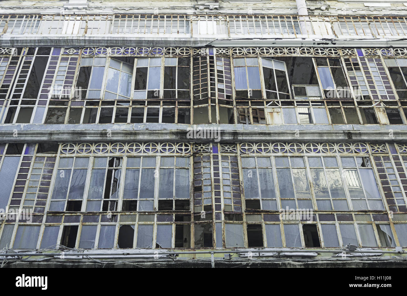 Rusting Building High Rise Ruined building with rusty glazing, construction Stock Photo - Alamy