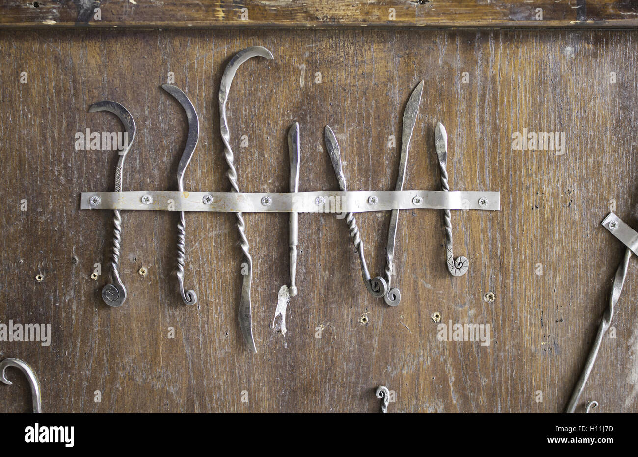 Inquisition old medical instruments and steel saws Stock Photo