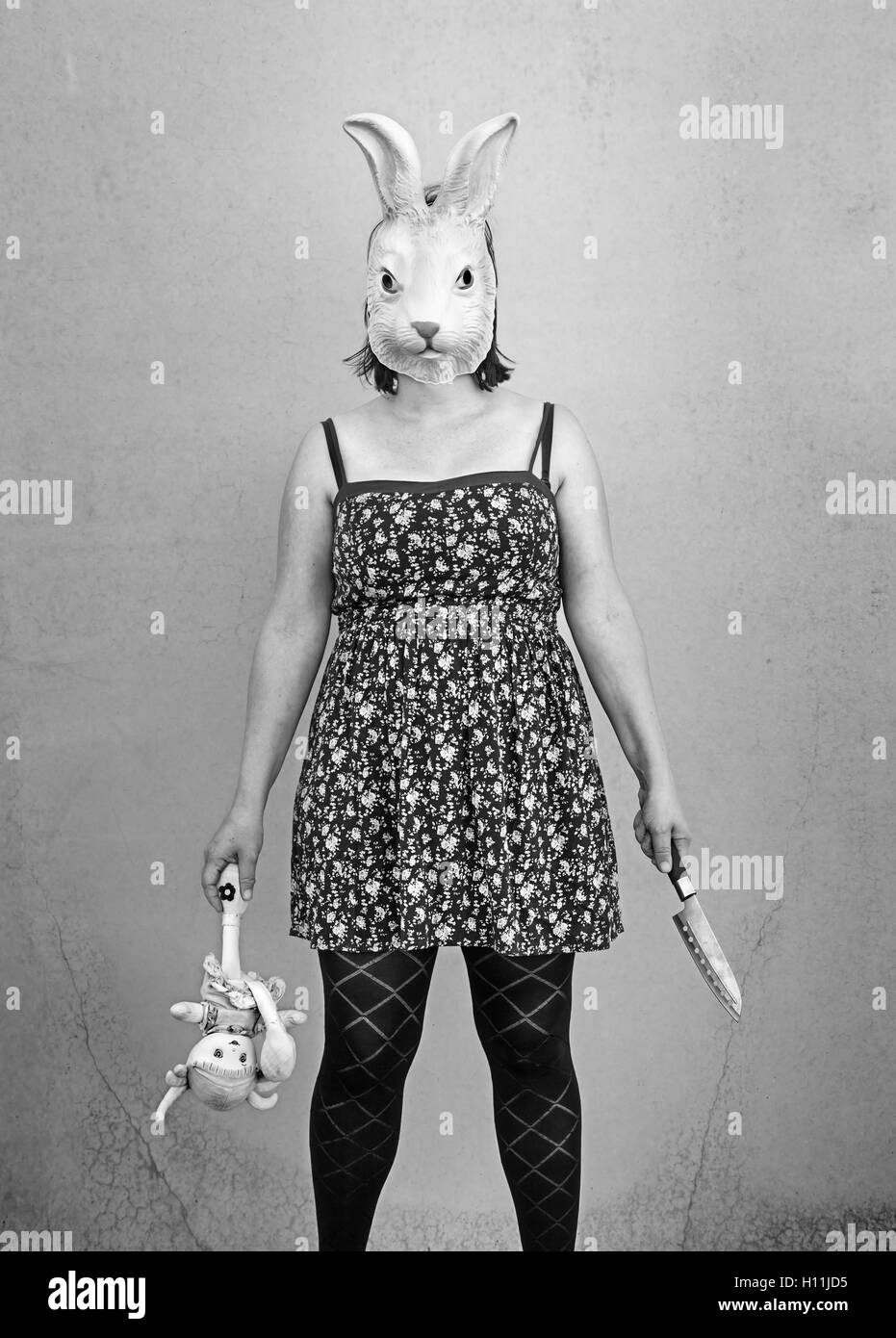Girl in halloween rabbit mask, fear and terror Stock Photo