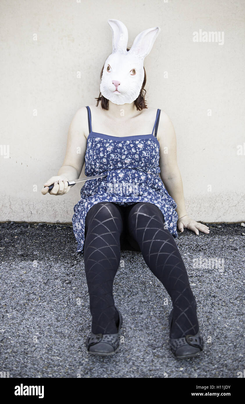Girl in halloween rabbit mask, fear and terror Stock Photo