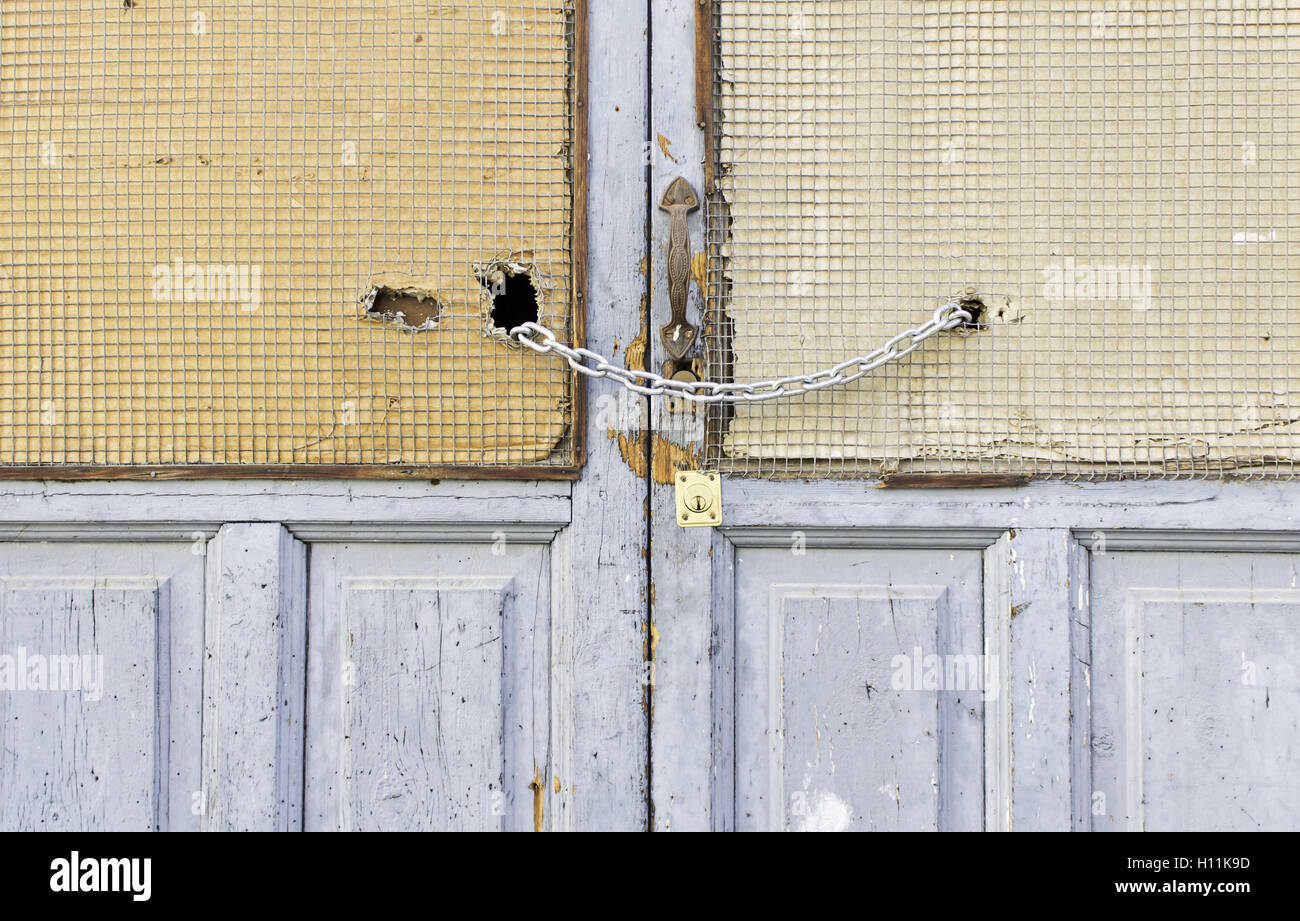 Safe and broken door lock, construction Stock Photo