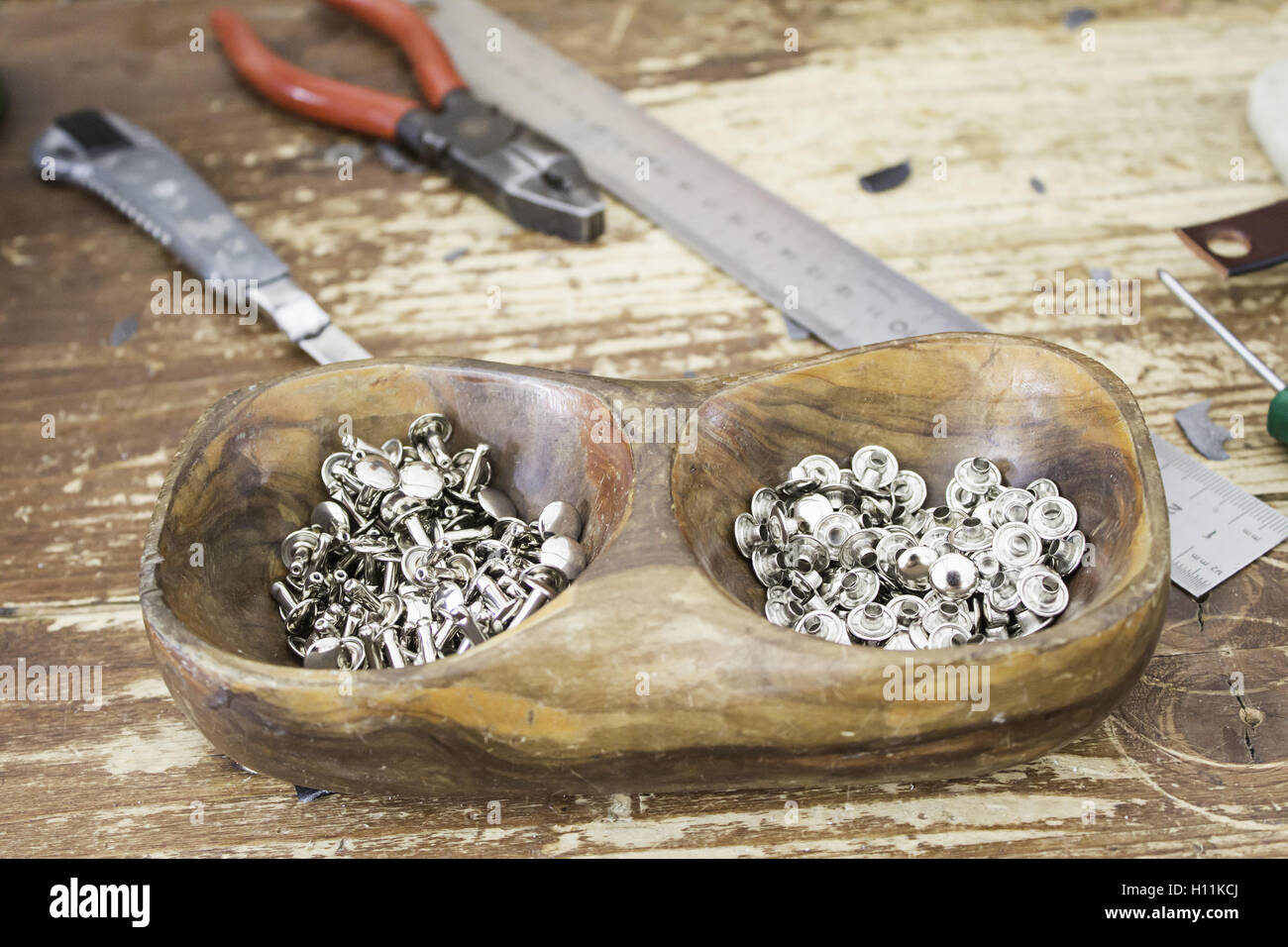 Metal Button Process Manufacturing metal buttons for belts, business Stock Photo - Alamy