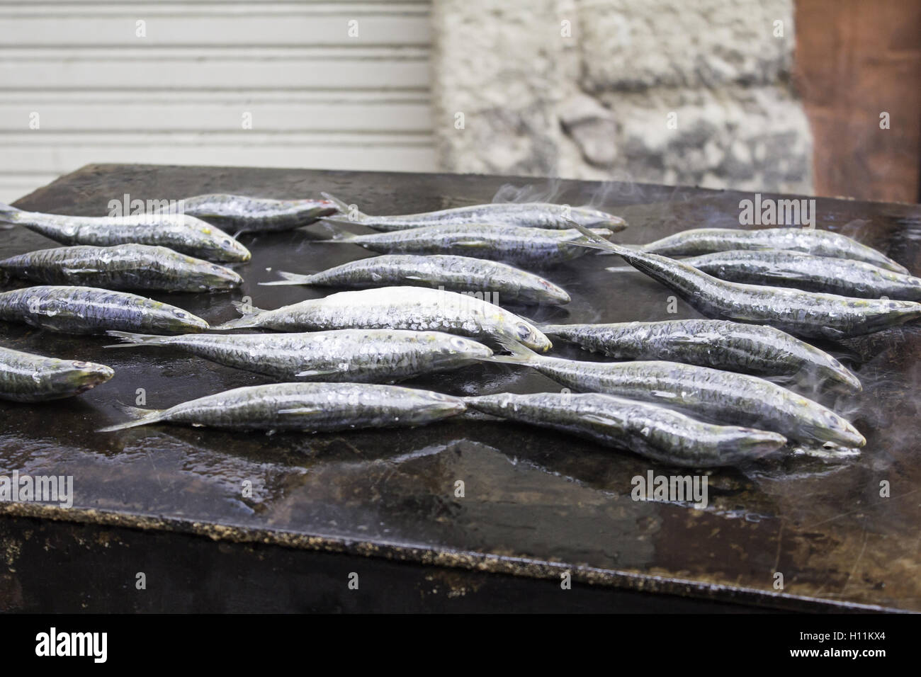 Grilled sardines in restaurant, fish and meal Stock Photo Alamy