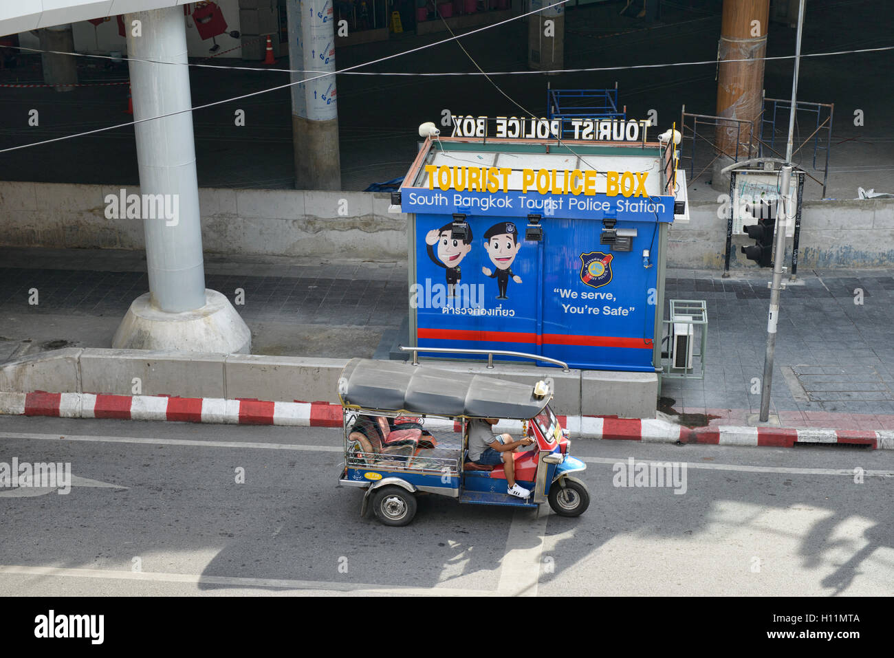 Iconic Bangkok scene, tuk tuk and tourist police box, Bangkok, Thailand Stock Photo