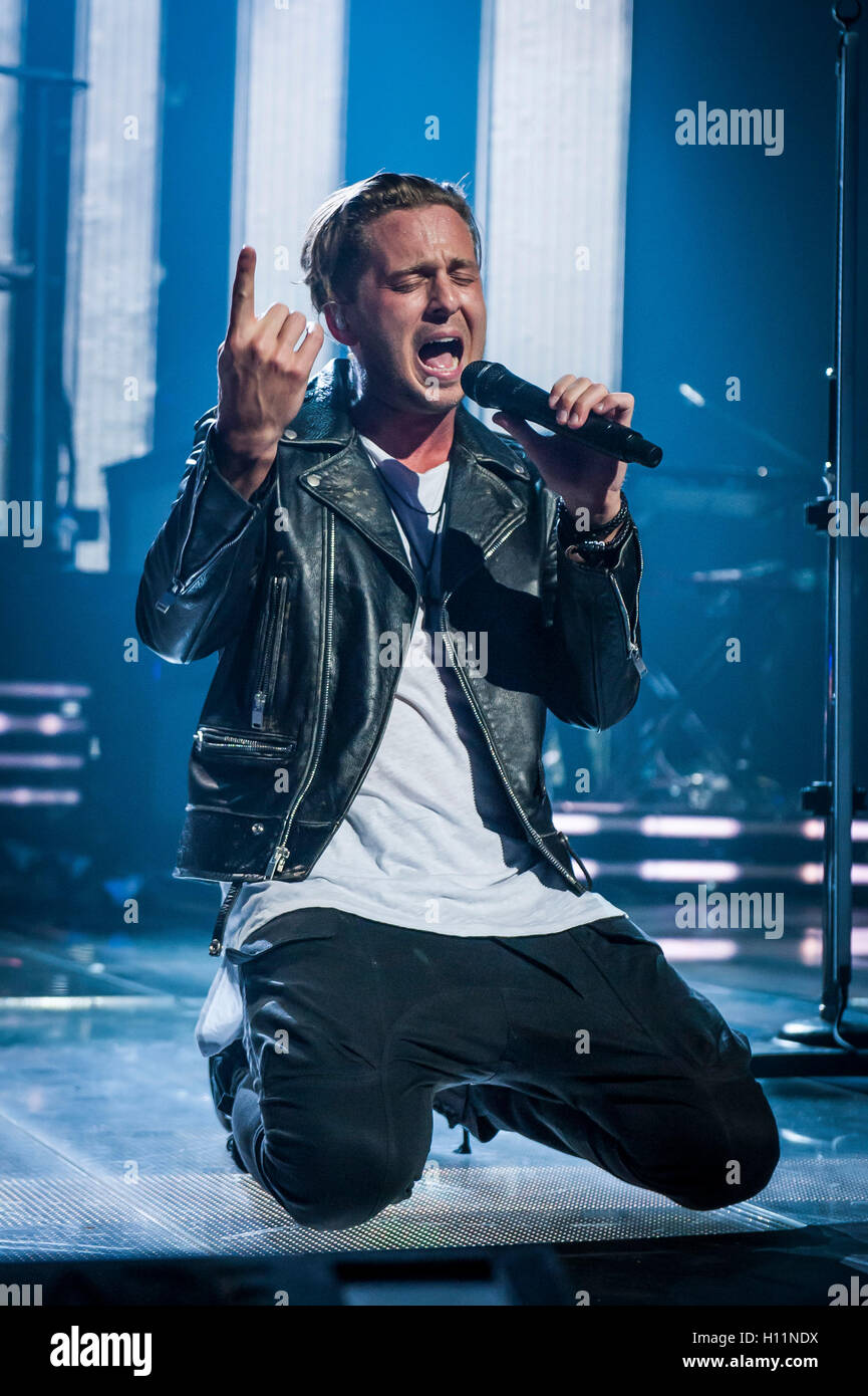 Ryan Tedder of One Republic perform live on stage as part of the Apple