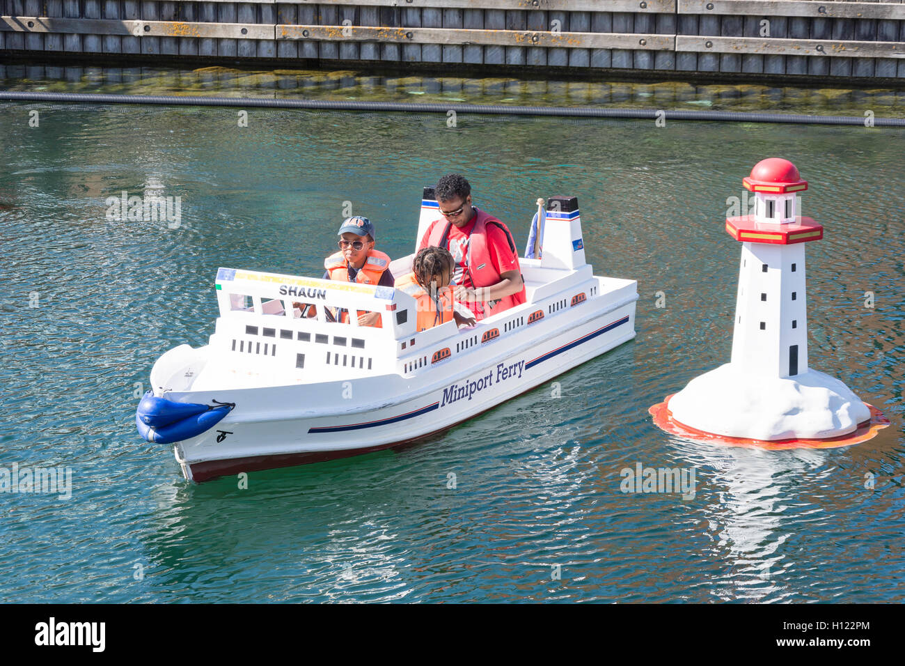 Children riding in a Miniport Ferry, Gunwharf Quays, Portsmouth Harbour