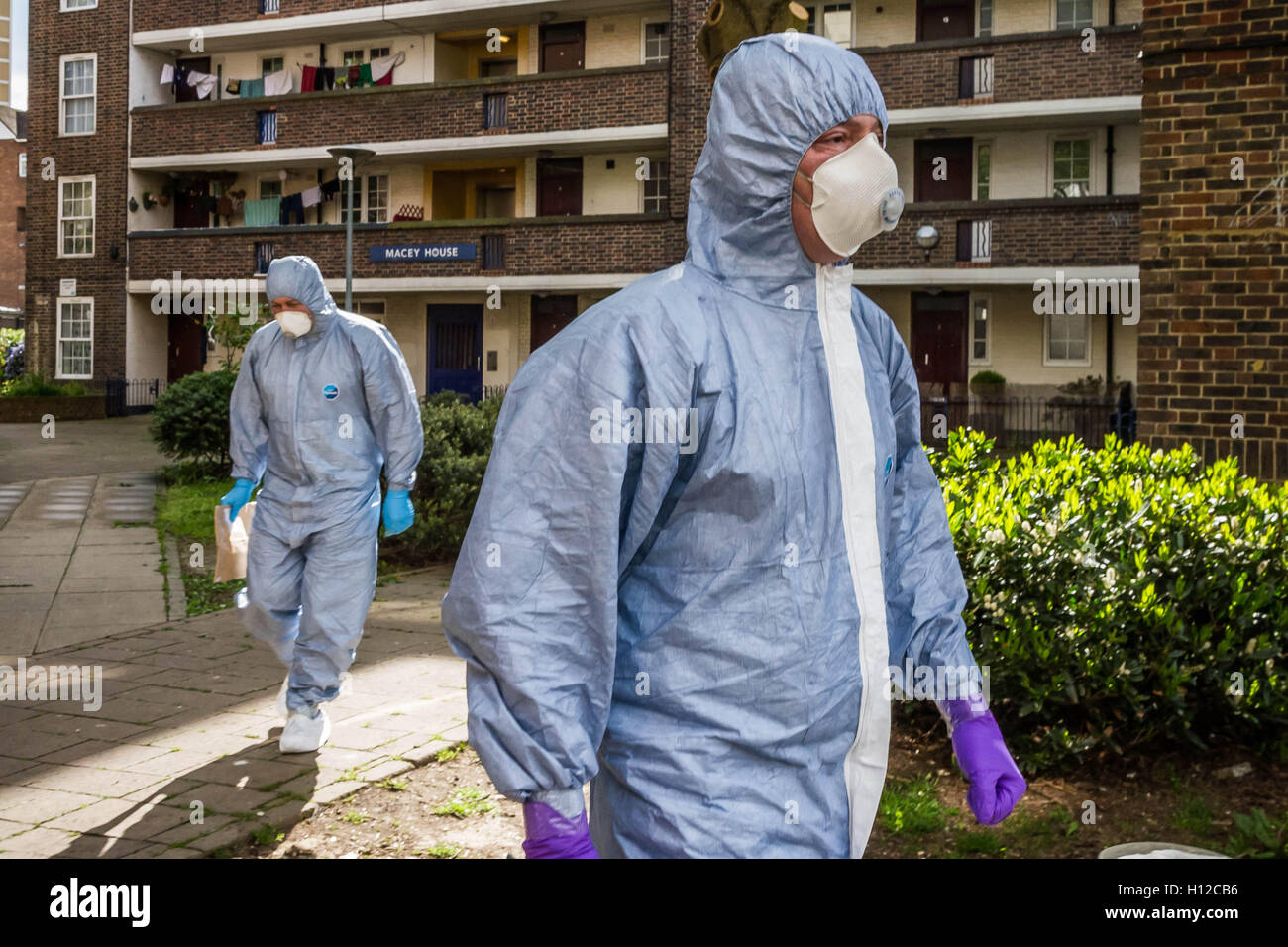 Counter-terrorism forensic team search and remove items from Islamist terrorist Michael Adebowale's flat in south east London, UK. Stock Photo