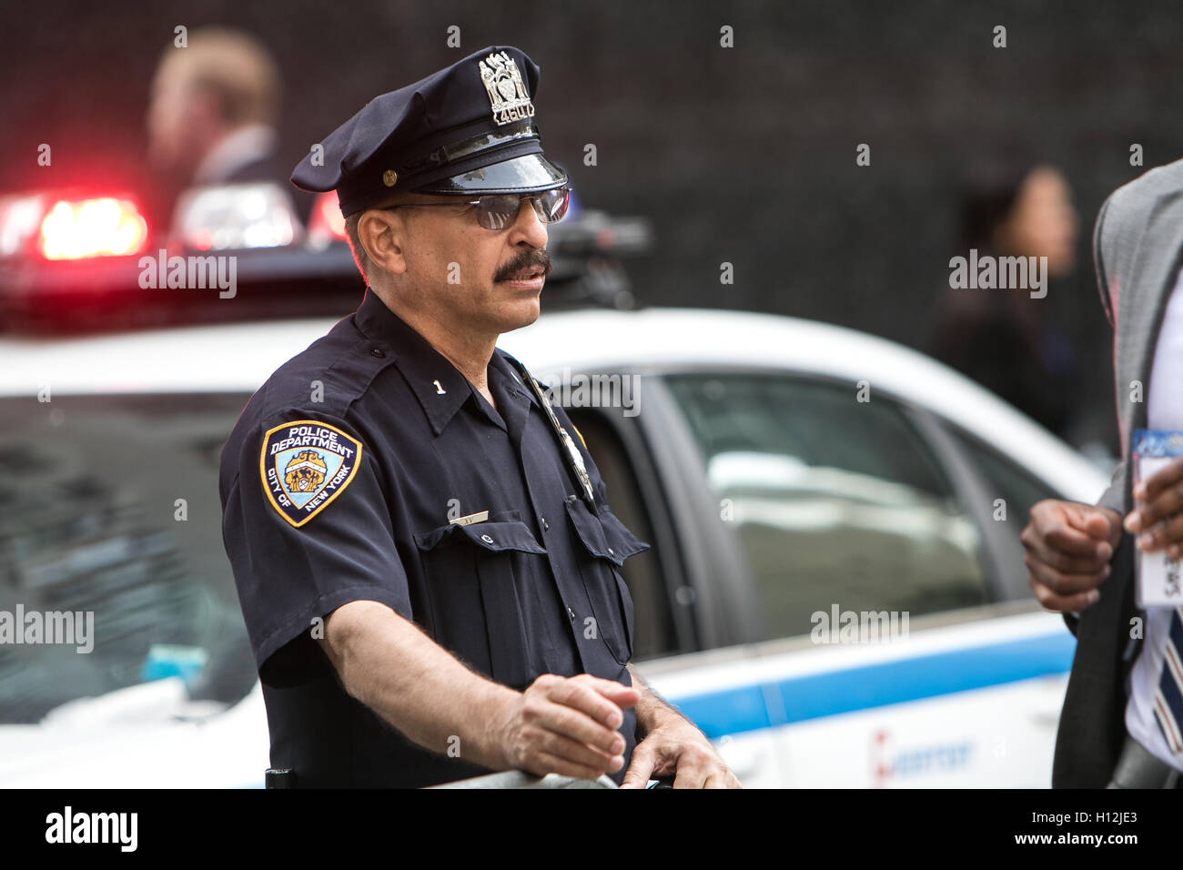 A policeman on the 2nd Avenue. There is a heavy police presence in United Nations area during the UN General Assembly. Stock Photo
