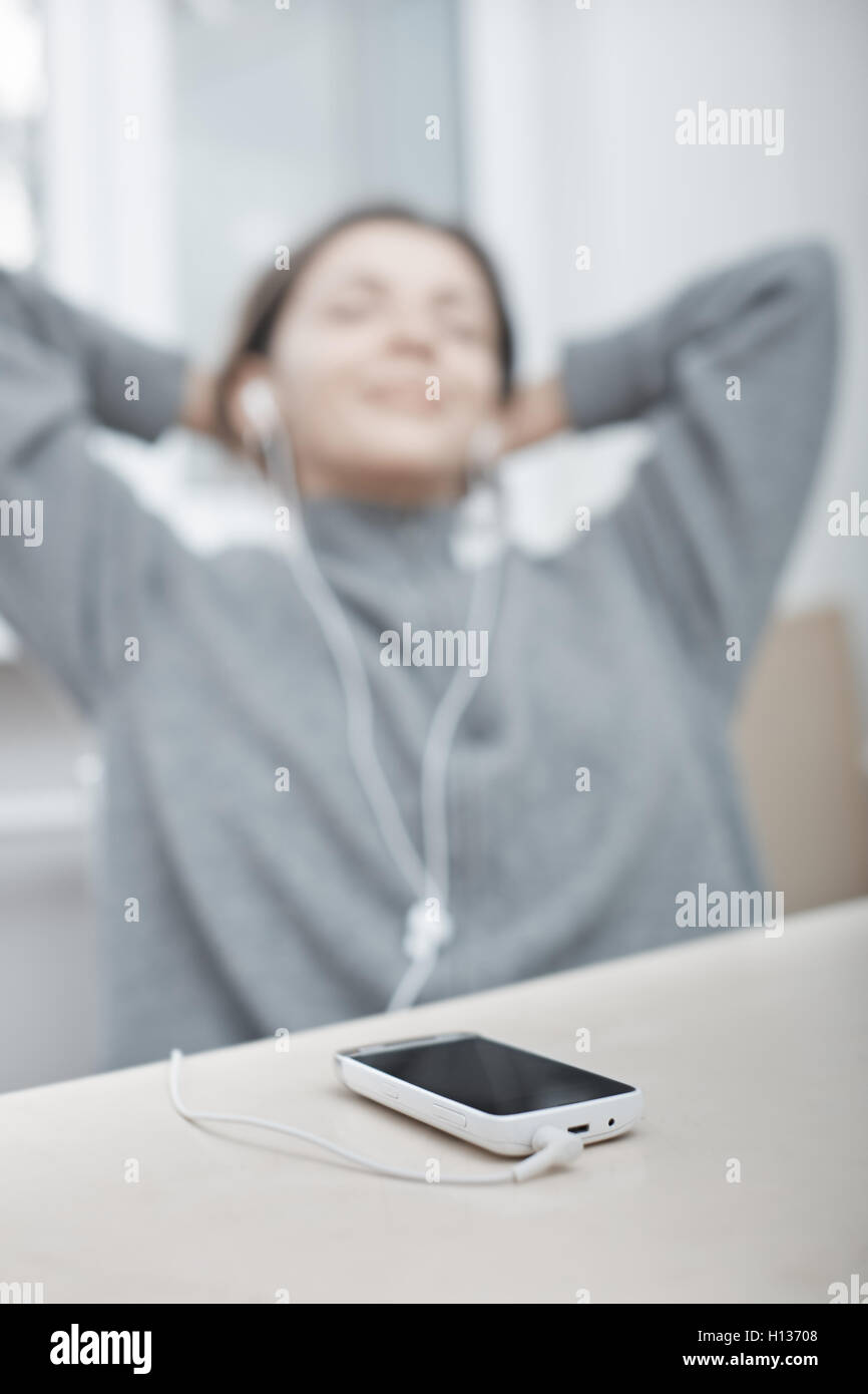 Smartphone with earphones Stock Photo Alamy