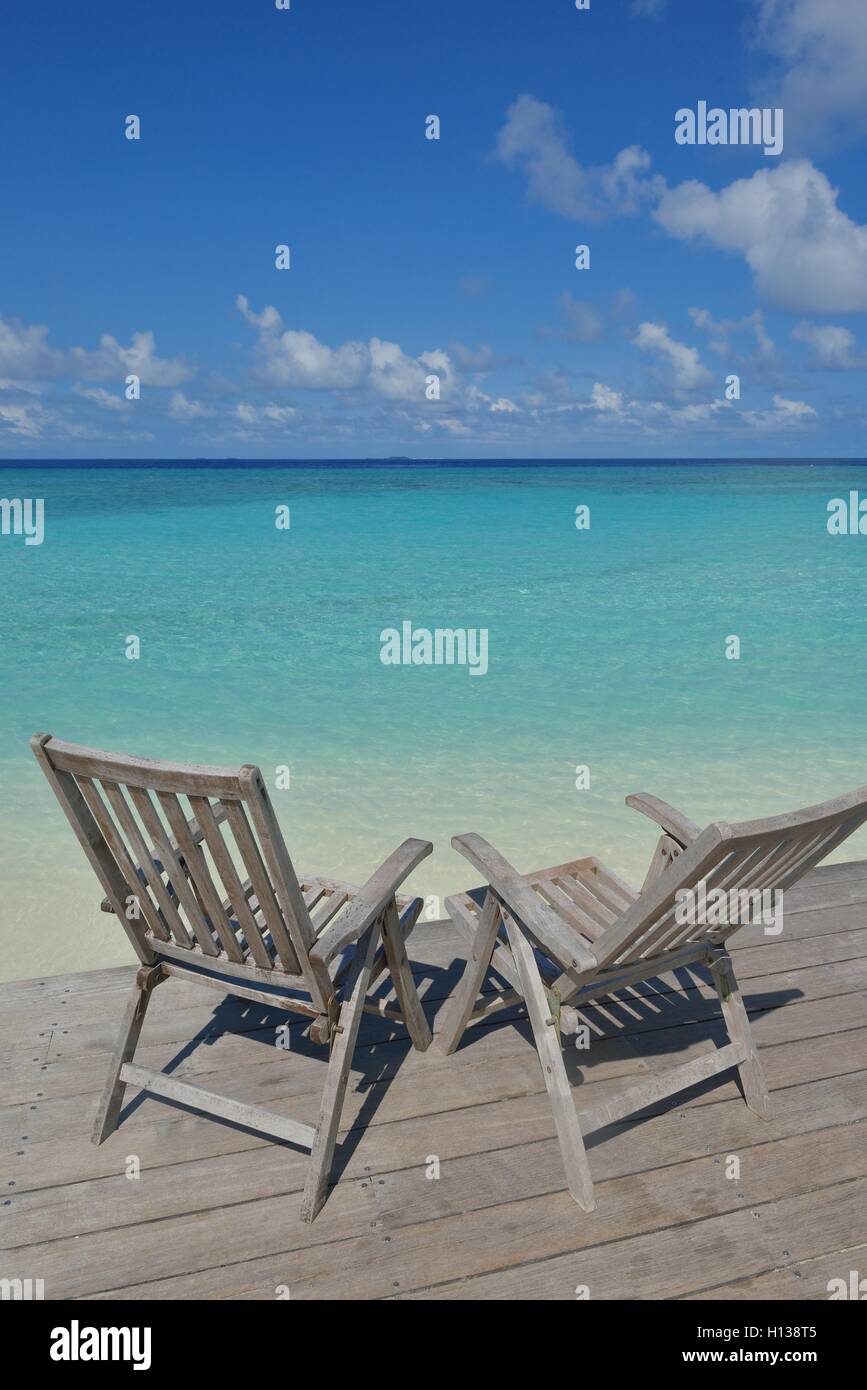 tropical beach chairs Stock Photo - Alamy