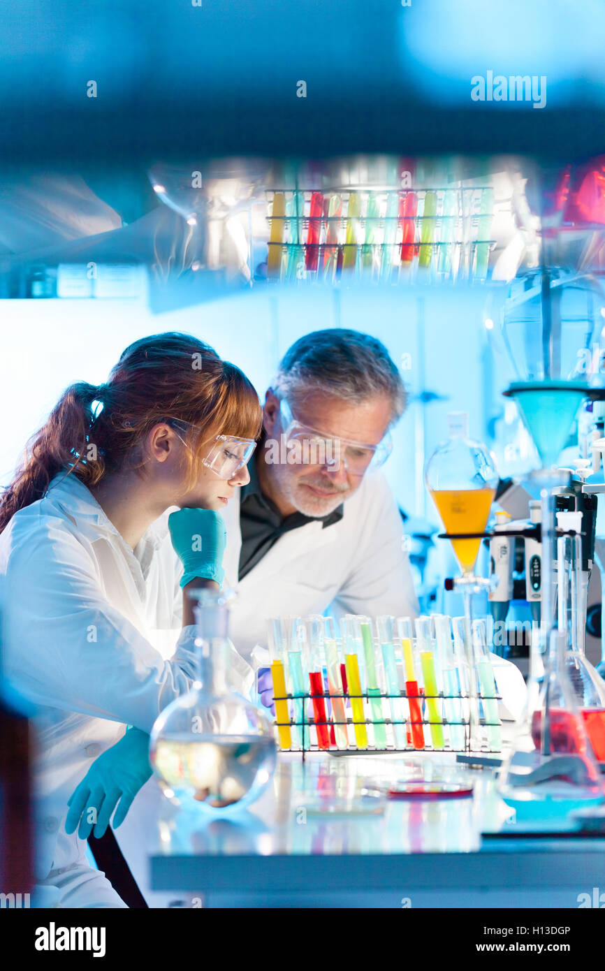 Female lab coat equipment hi-res stock photography and images - Alamy