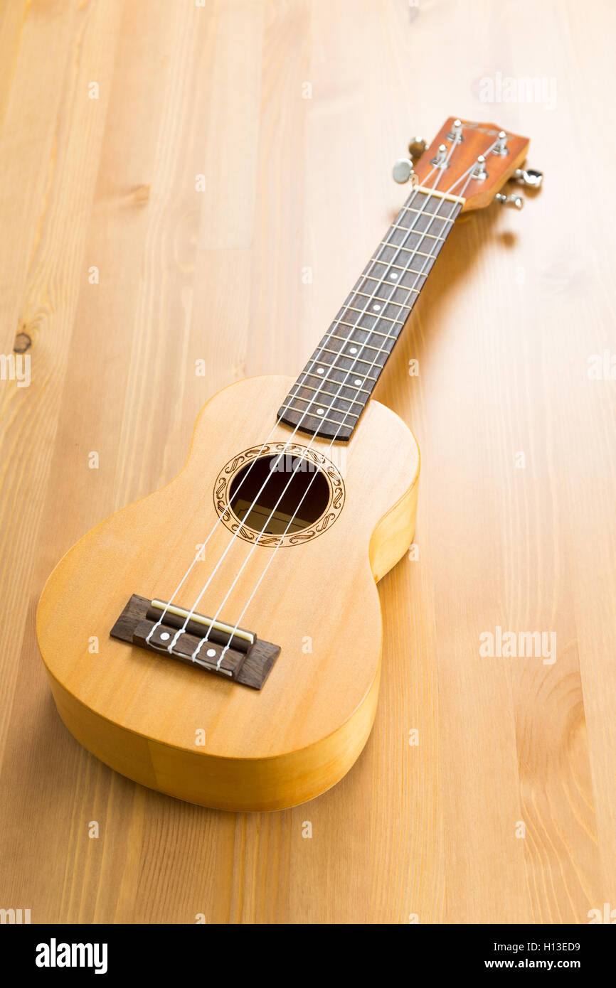 ukulele on wood background Stock Photo