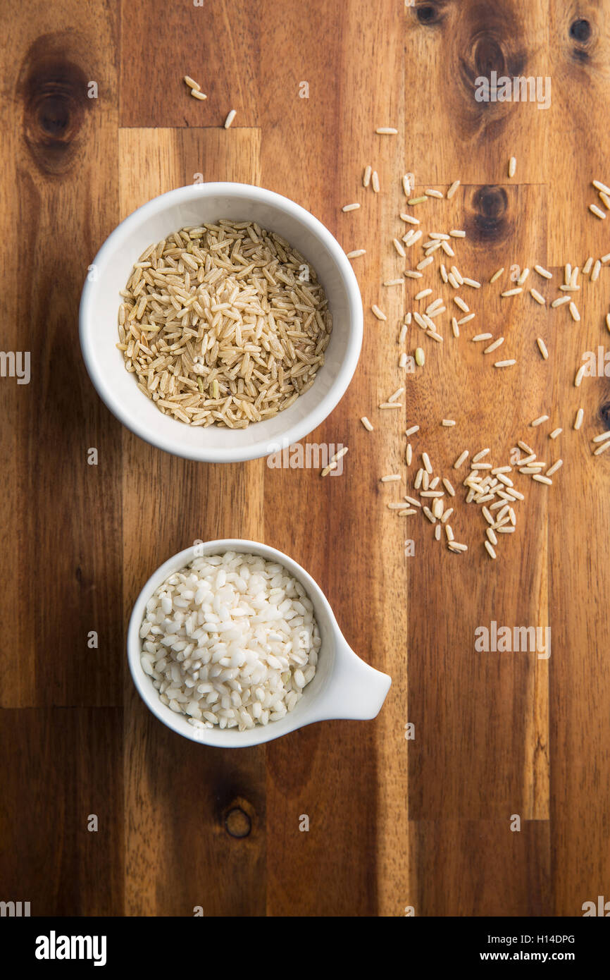Arborio and thaibonnet rice in bowl. Top view Stock Photo - Alamy
