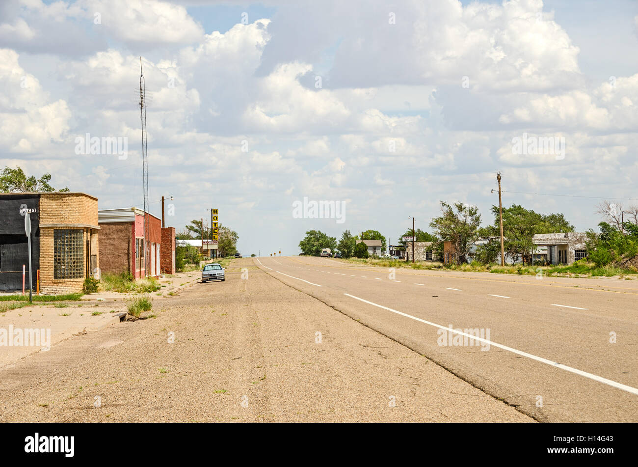 City street with no traffic due to an interstate bypassing the town Stock Photo