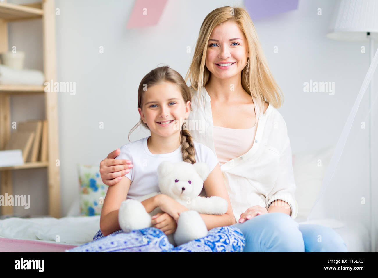 Girl with mother Stock Photo