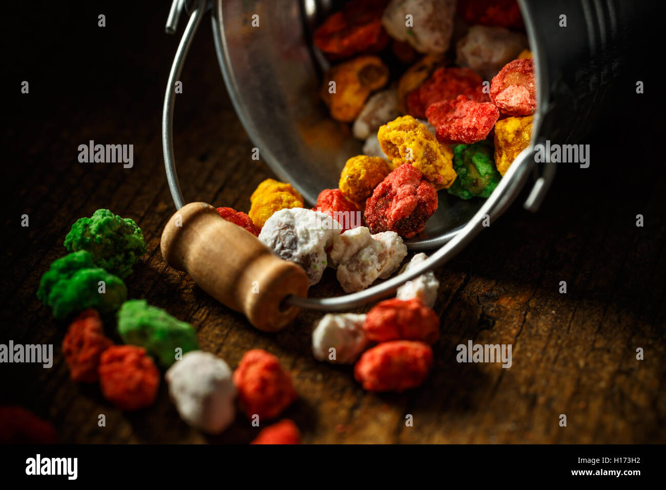 Hazelnut in colorful sugar, crunchy sweets Stock Photo