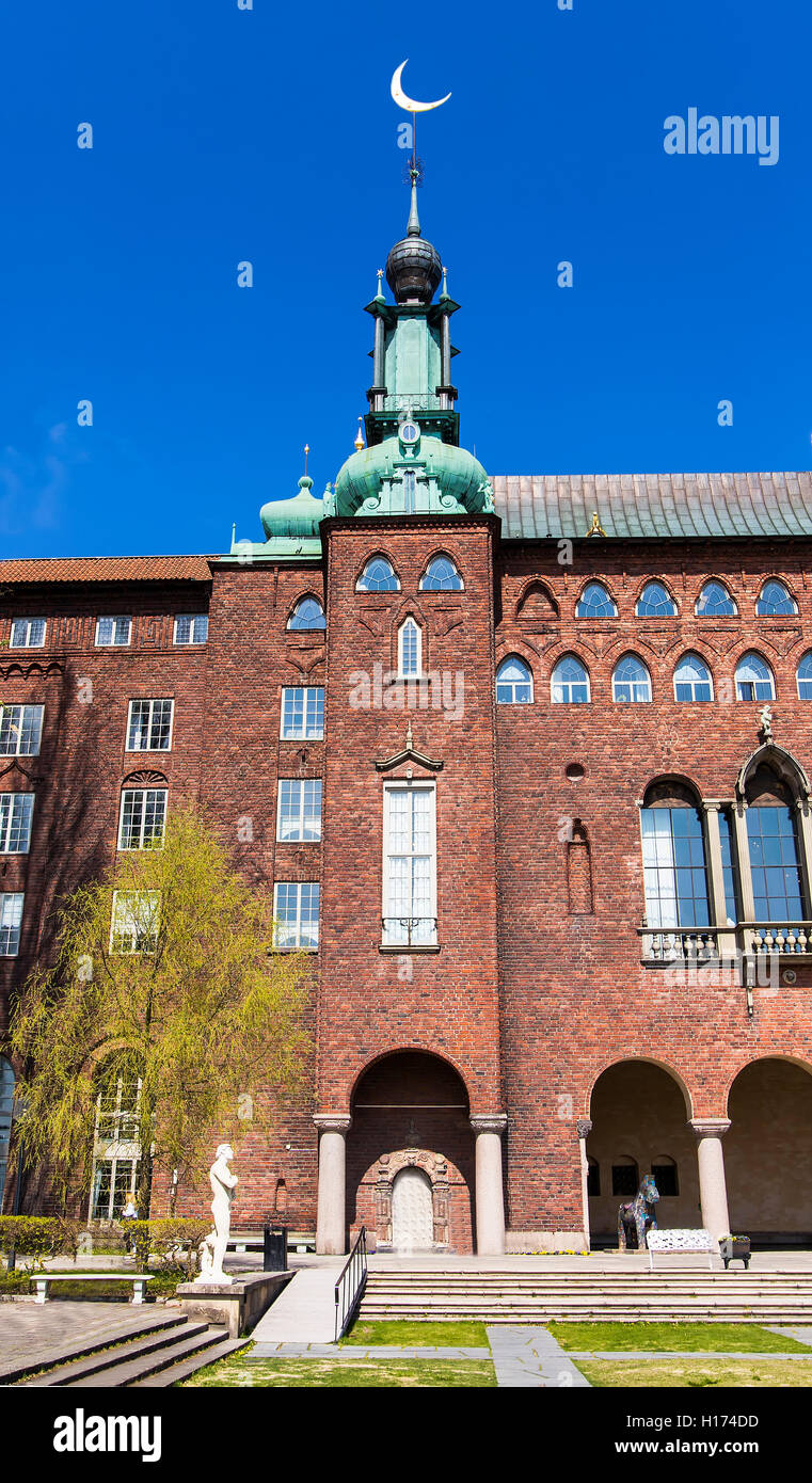 Town hall tower with a spire on the month in Stockholm. Sweden Stock Photo