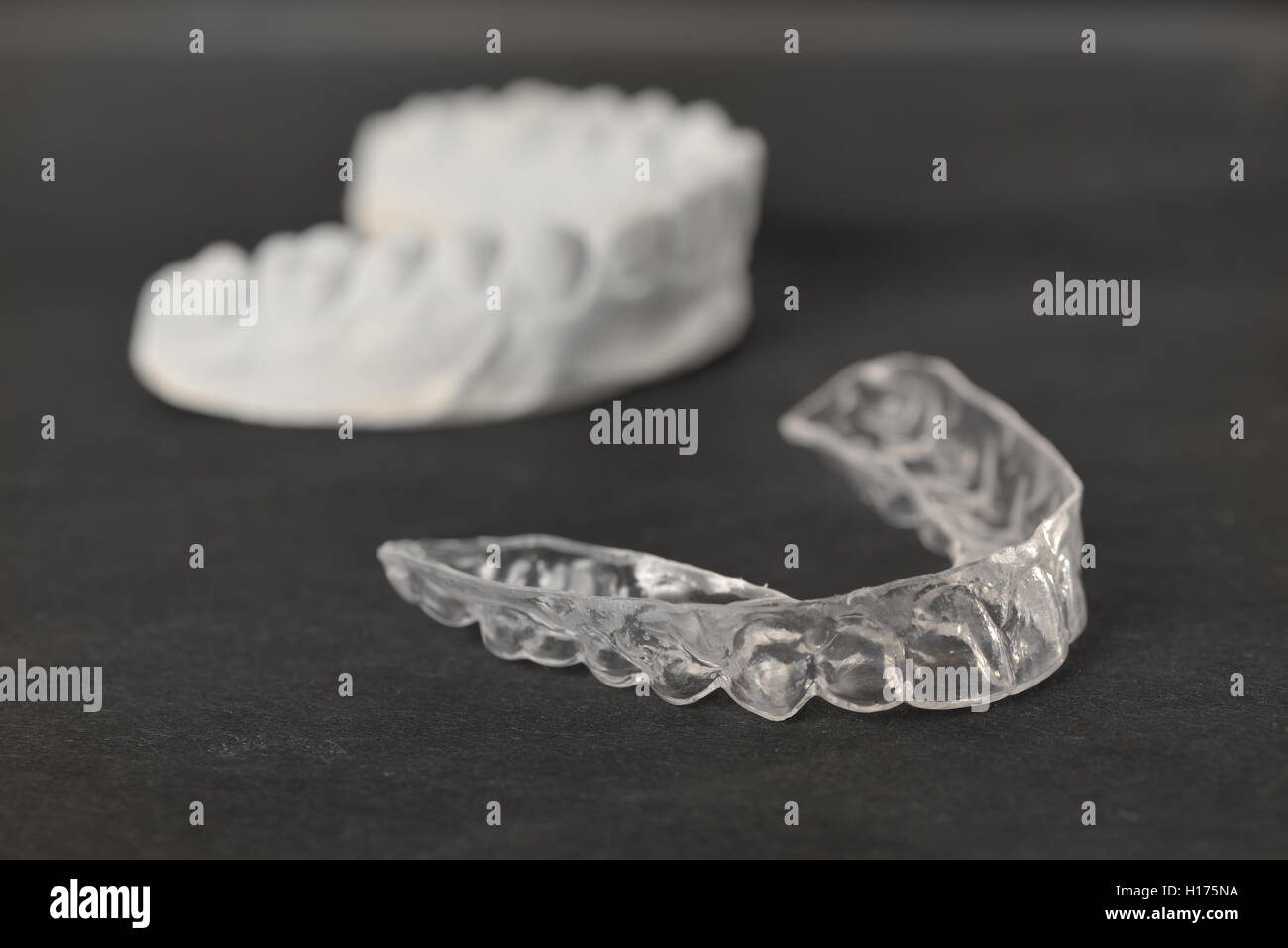 tooth brackets transparent braces to straighten teeth Stock Photo