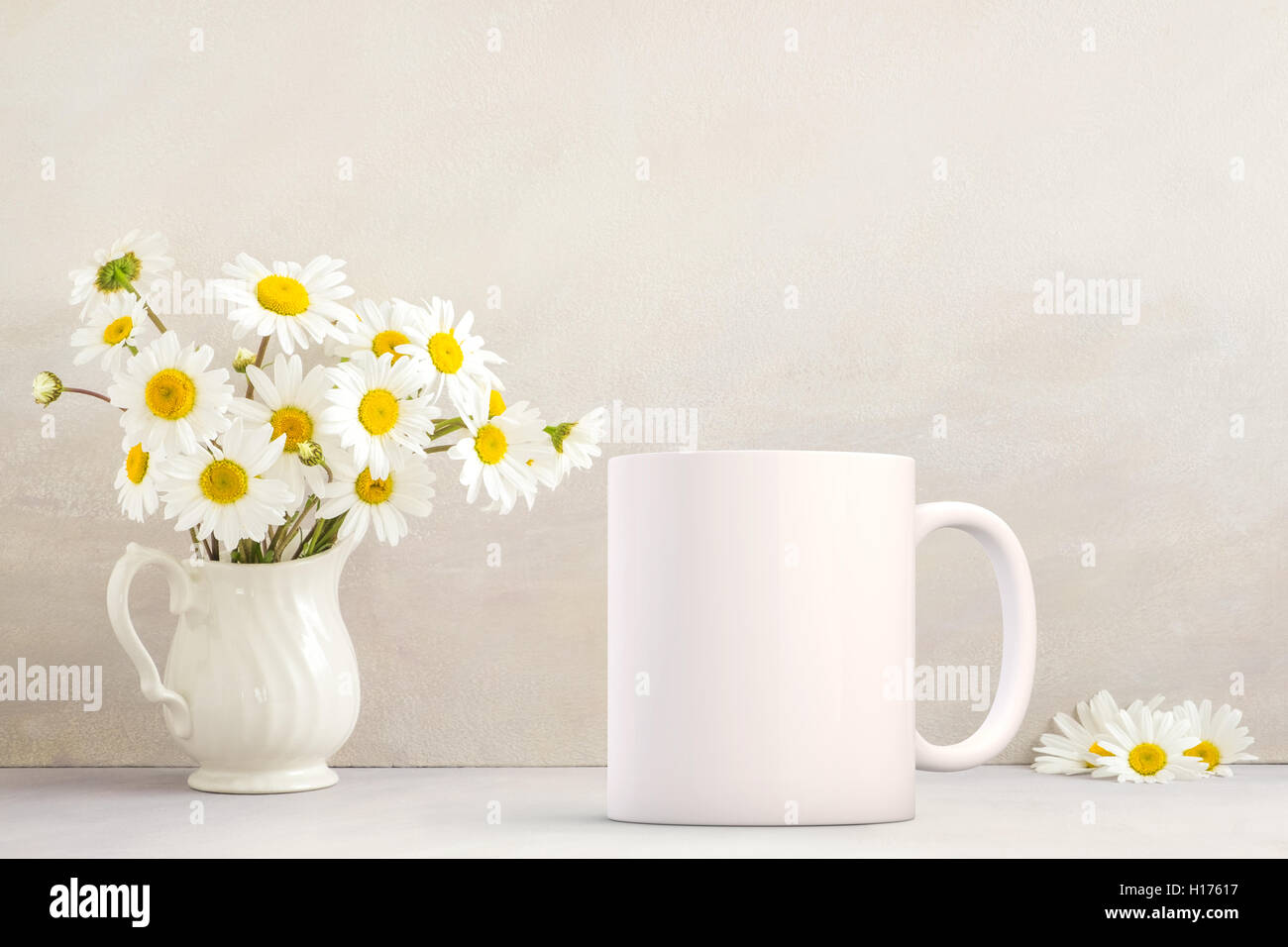 https://c8.alamy.com/comp/H17617/mockup-styled-stock-product-image-white-mug-that-you-can-add-your-H17617.jpg