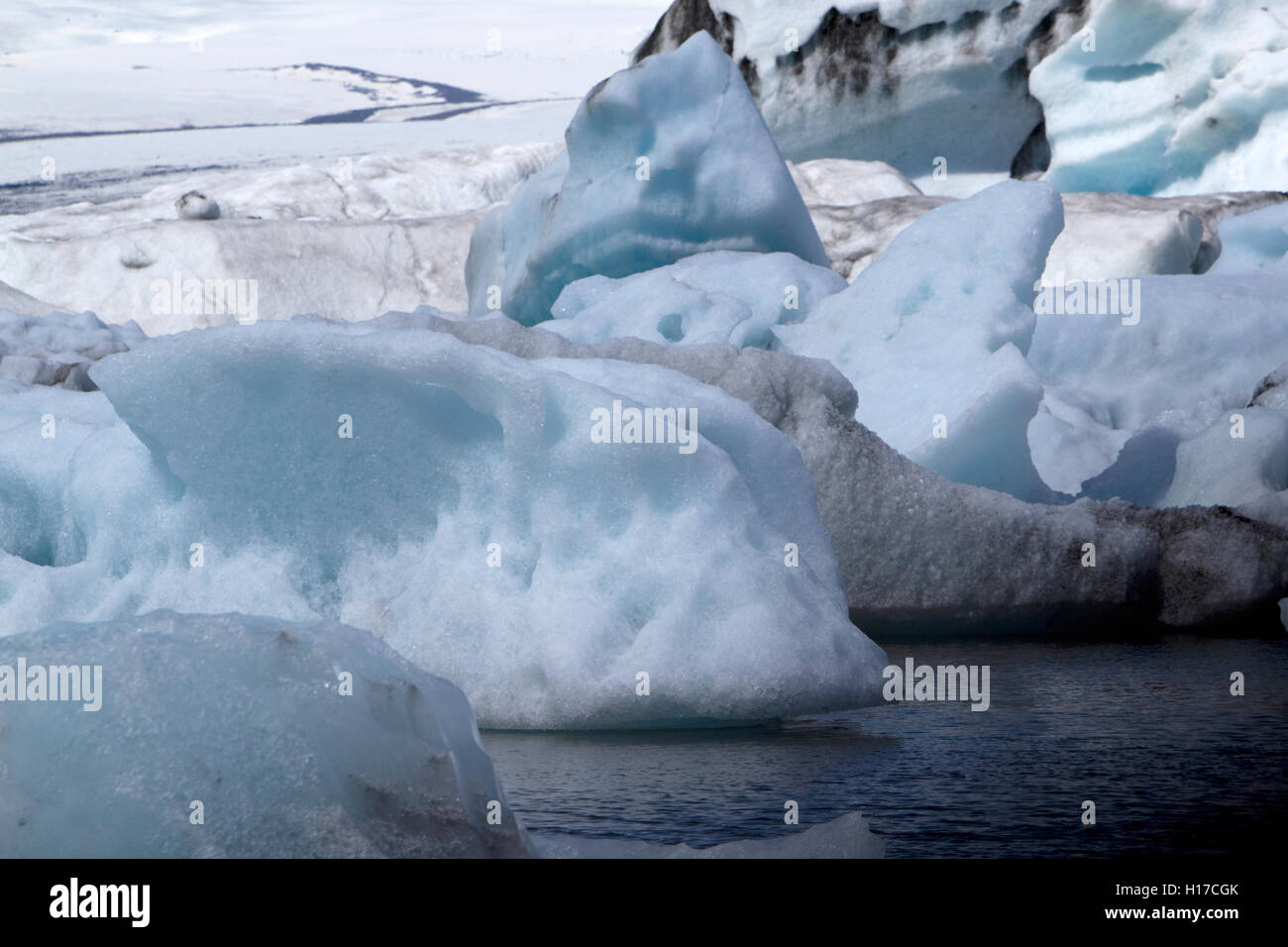 blue ice icebergs on Jokulsarlon glacial lagoon Iceland Stock Photo