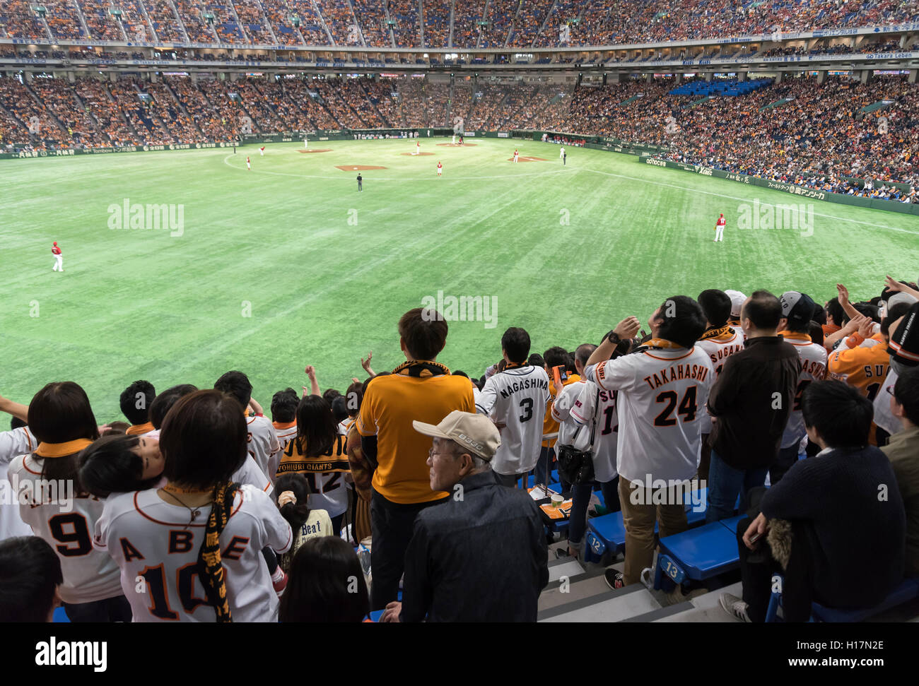 Supporters of Yomiuri Giants baseball team at Tokyo Dome stadium, Japan Stock Photo