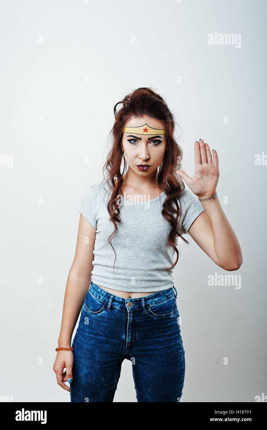 Studio portrait of girl with asian appearance and bright make up with ...