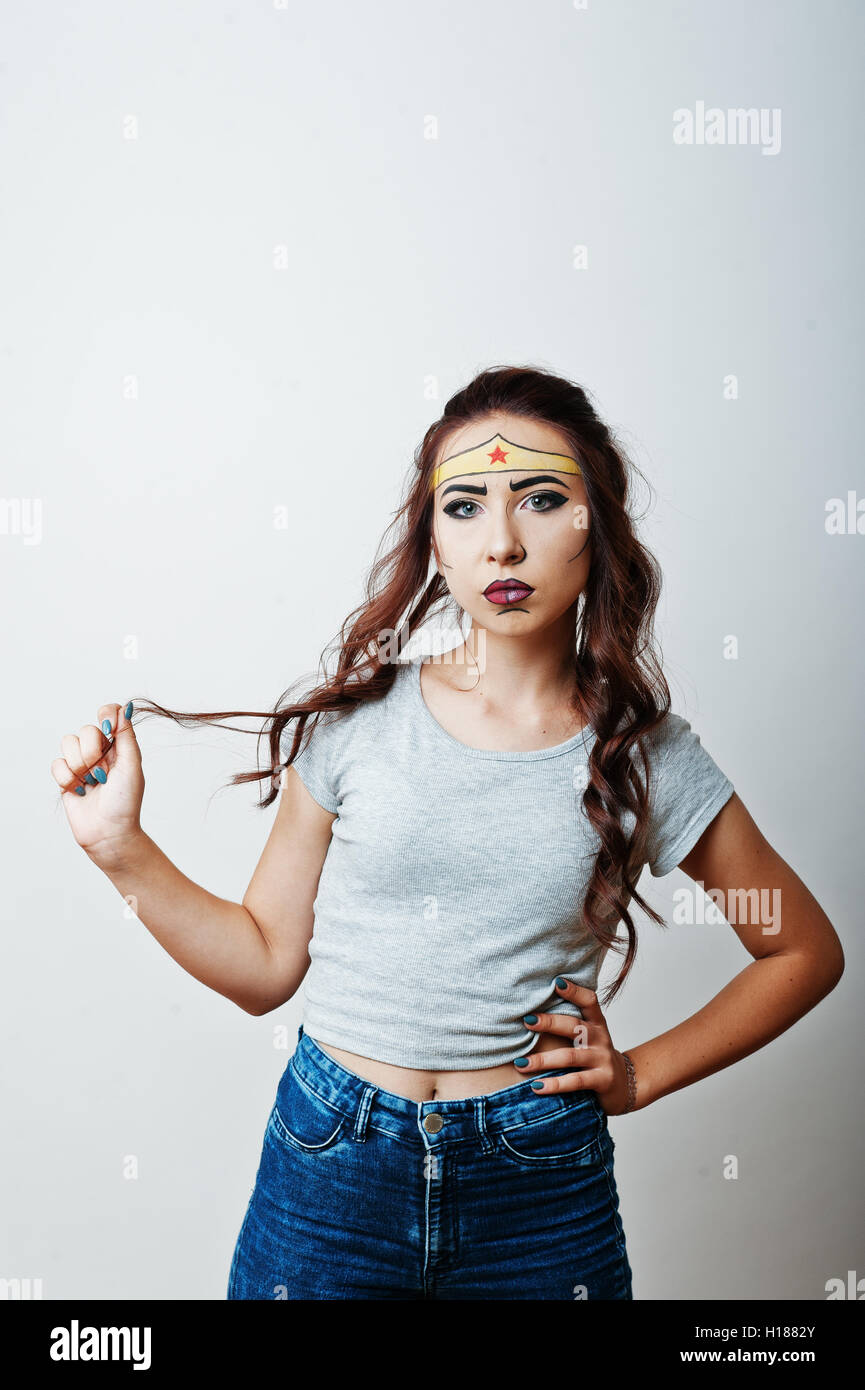Studio portrait of girl with asian appearance and bright make up with ...