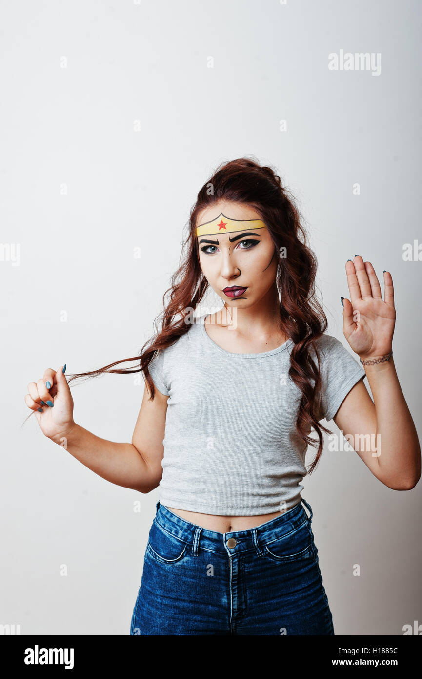 Studio portrait of girl with asian appearance and bright make up with ...