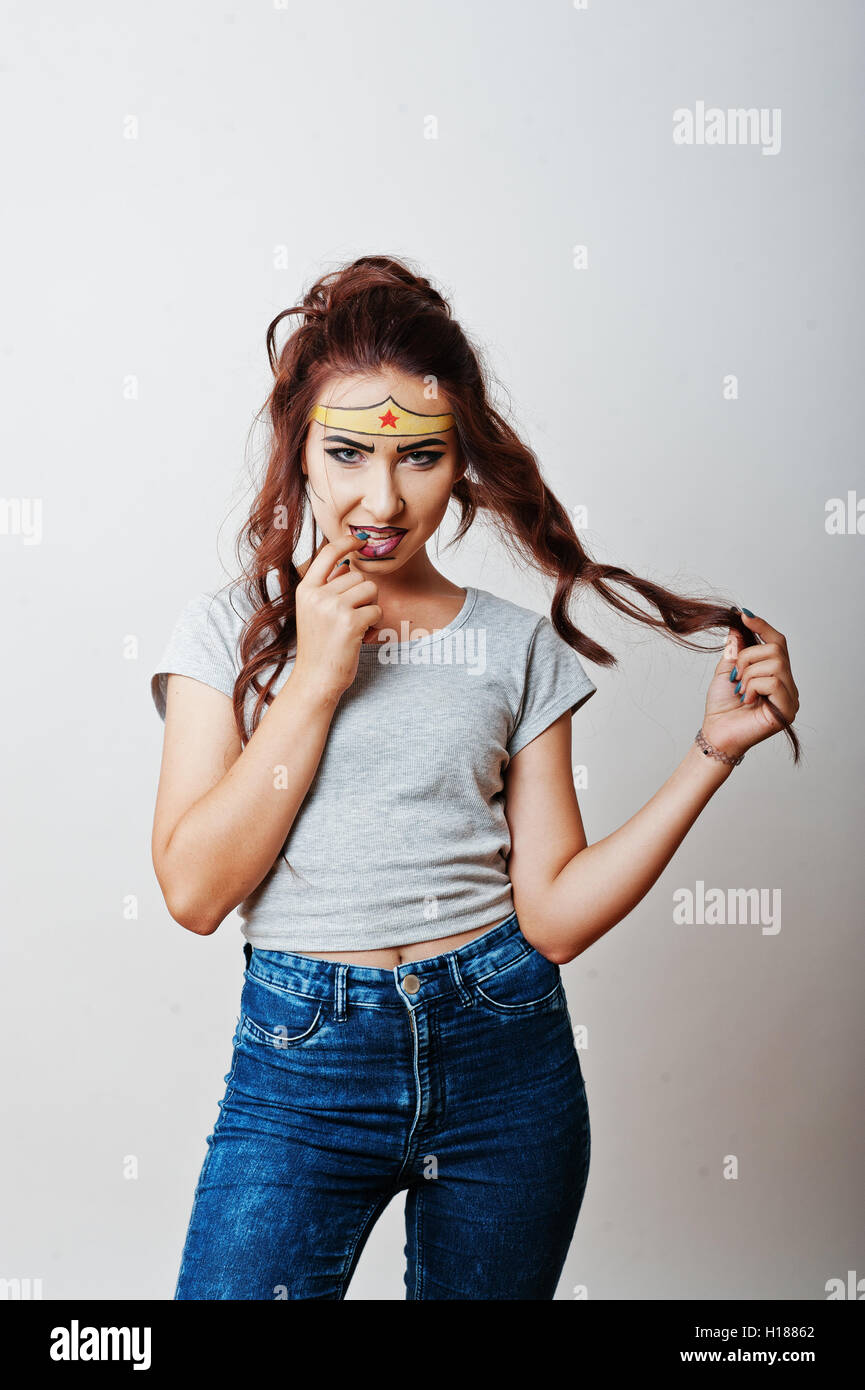 Studio portrait of girl with asian appearance and bright make up with ...