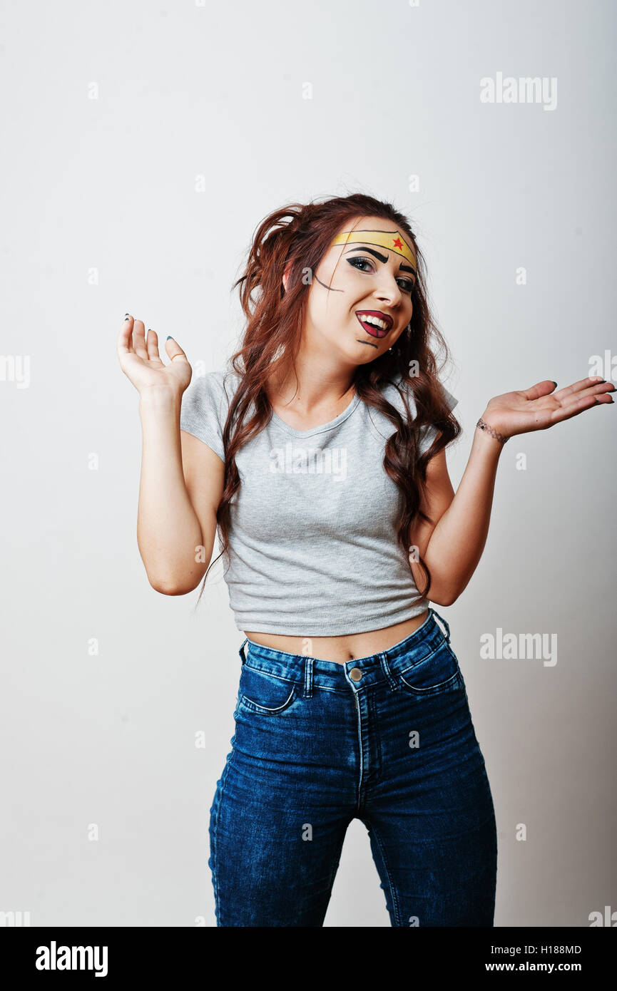 Studio portrait of girl with asian appearance and bright make up with ...