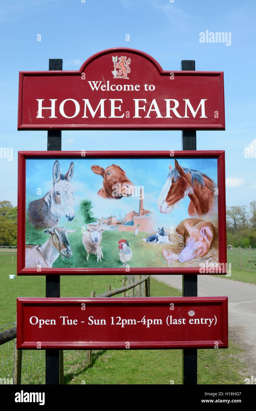 A 'Welcome to home farm' shop sign at Tatton park, Knutsford, Cheshire, UK Stock Photo